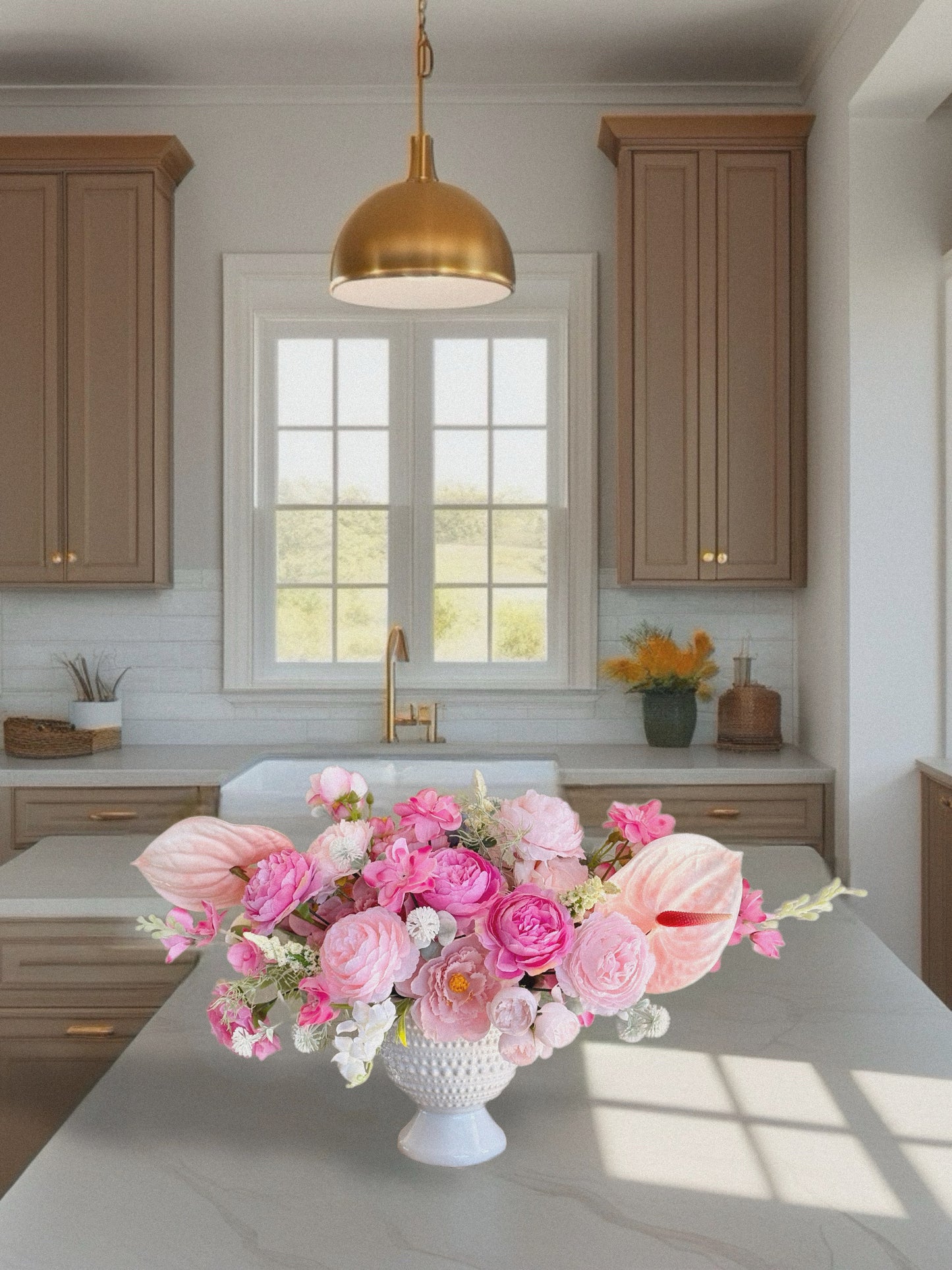 Pink romantic style bouquet with peonies and roses in a ceramic vase