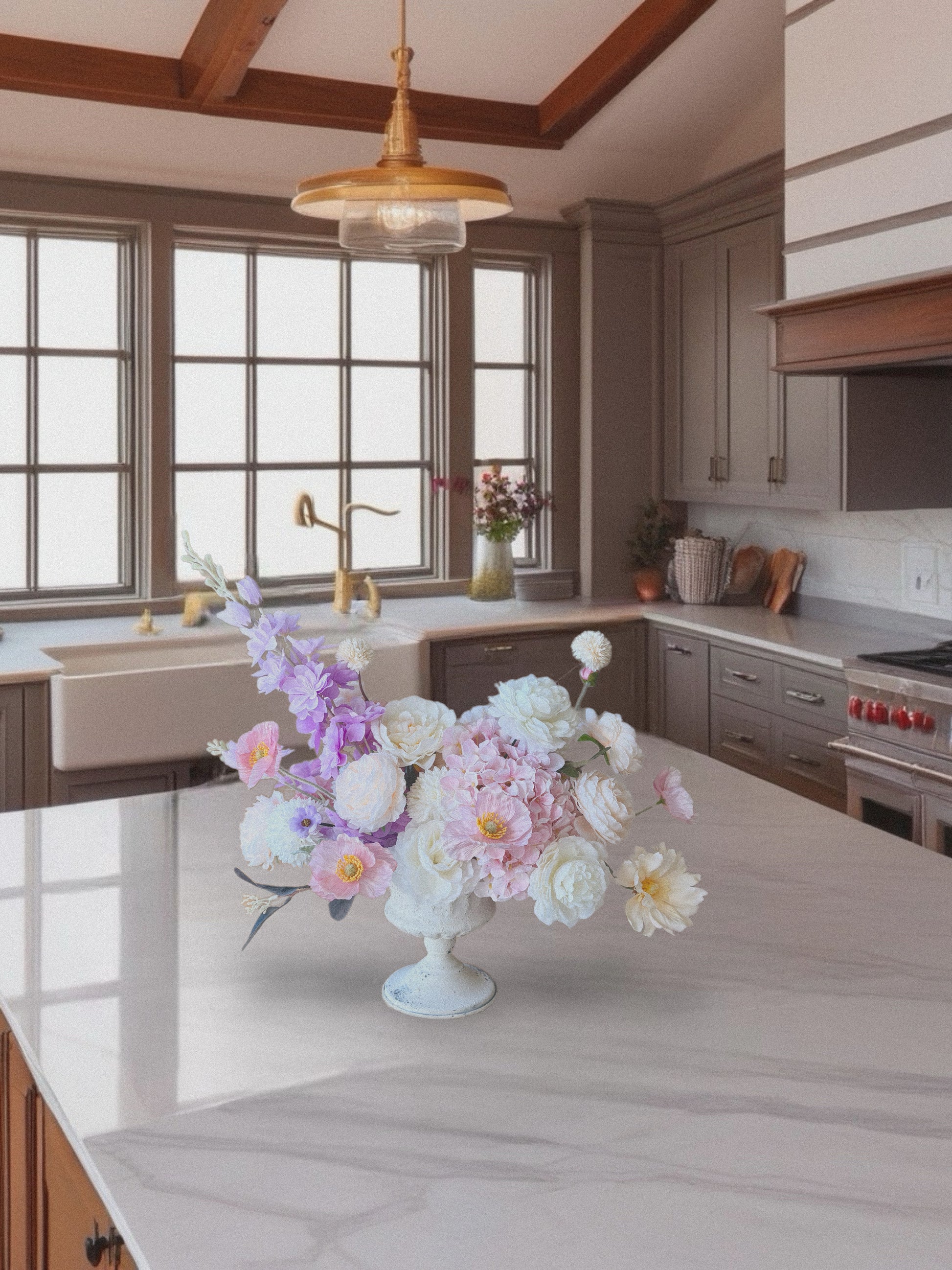 Kitchen with a flower arrangement on the counter